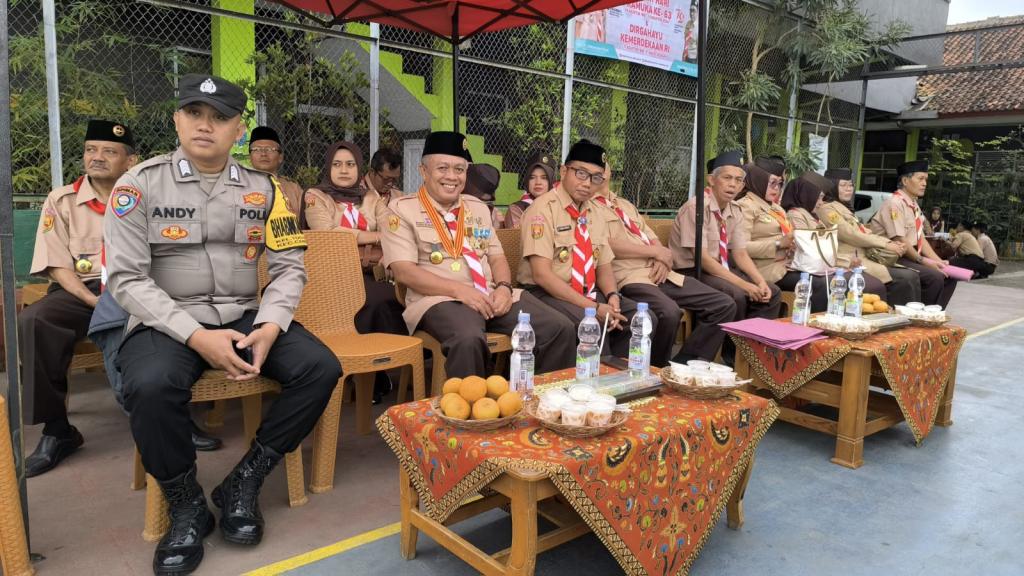 Personel Polsek Cihideung Tasikmalaya Hadiri Peringatan HUT ke-63 Pramuka Tingkat Kecamatan